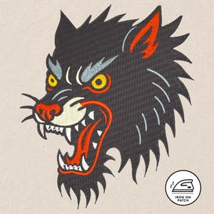 May include: Embroidered patch featuring a stylized wolf head with an open mouth. The wolf is black with red, yellow, and white accents. The patch has an "Iron On Patch" logo in the bottom right corner.