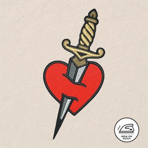 May include: Embroidered patch featuring a red heart pierced by a dagger. The dagger has a gold handle and a silver blade. The patch is on a beige background and includes the text "Iron On Patch".