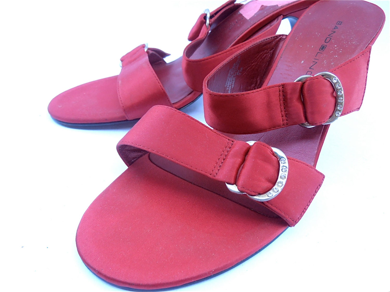 red satin high heel shoes