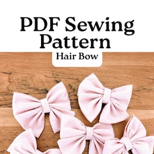 May include: Six light pink fabric hair bows arranged on a wooden surface. The bows are tied in the center and have a classic bow shape. Text at the top reads "PDF Sewing Pattern Hair Bow".