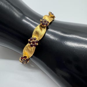 Vintage Crown Trifari birthday stone bracelet gold tone with rhinestone