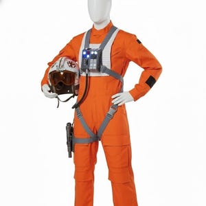 May include: A rustic wooden sign with the text "Welcome to our home" in white lettering. The sign features a distressed finish and a simple, inviting design, perfect for a front porch or entryway.