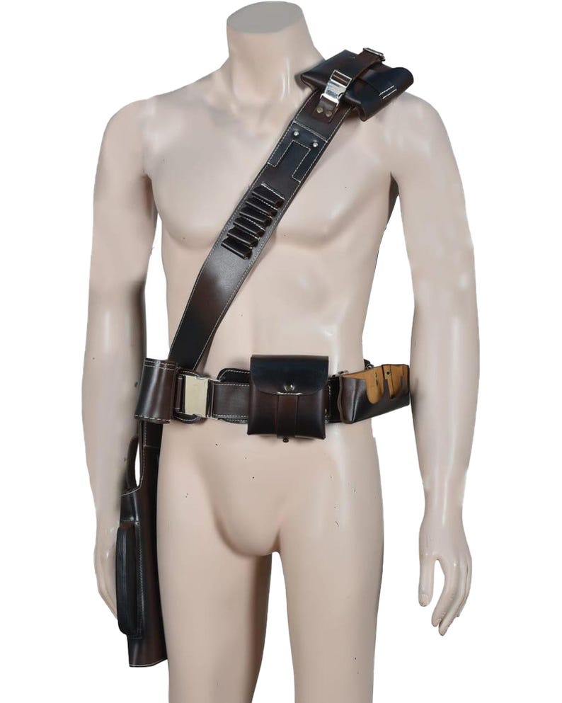 May include: A brown leather utility belt and shoulder strap set. The belt features multiple pouches and a holster, with a matching shoulder strap designed to hold additional items. The set is made of dark brown leather with silver-colored metal hardware.