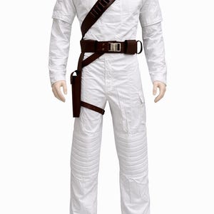 May include: A white jumpsuit with a high collar, quilted detailing, and brown leather belt and holster. The costume includes a shoulder strap with multiple pouches and brown leather boots. The outfit is displayed on a mannequin.
