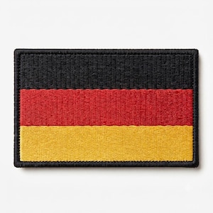 May include: A rectangular embroidered patch featuring the horizontal tricolour flag of Germany. The design consists of three equal horizontal bands in black at the top, red in the middle, and gold at the bottom, all bordered by a black stitched edge.