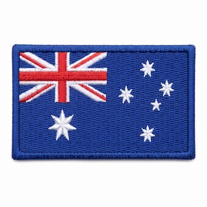 May include: A rectangular embroidered patch featuring the Australian flag. The design includes a blue field with a red and white Union Jack in the upper left corner, a large white seven-pointed Commonwealth Star, and five smaller white stars.