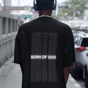Born of God Christian T-Shirt Comfortable Faithshirt Graphic Tee with Bible Verse Christian Gift for New Believers