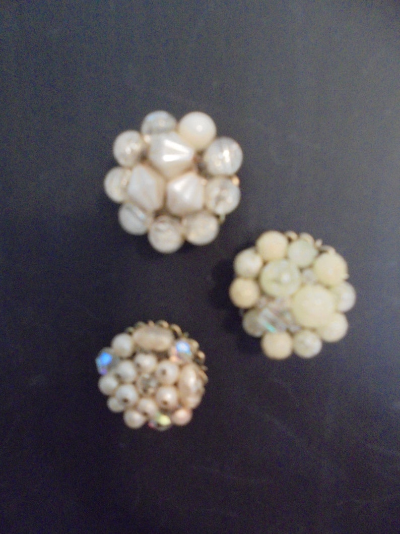 Repurposed earring magnets in shades of white