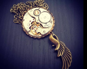 Steampunk Inspired with a wing ~ Timeless Relic in Brass Setting