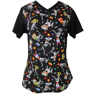 May include: Black scrub top with a colorful print of skeleton dogs with flowers and bones.