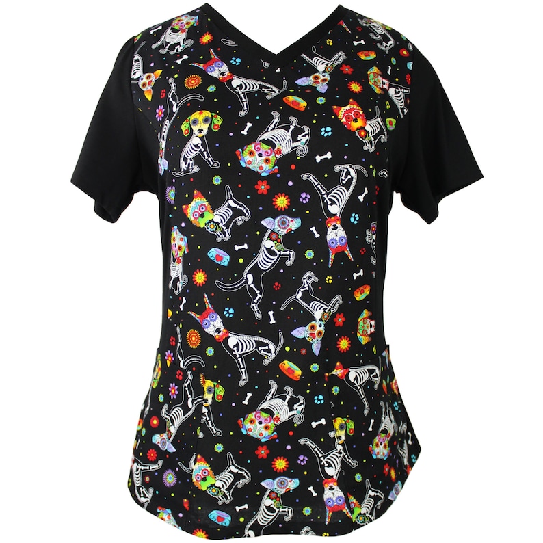 May include: Black scrub top with a colorful print of skeleton dogs with flowers and bones.