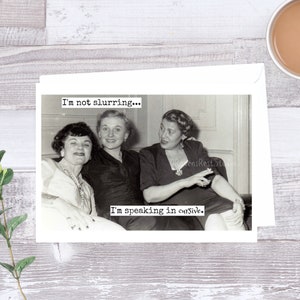 May include: Black and white photograph of three women sitting together. The caption reads "I'm not slurring... I'm speaking in cursive."