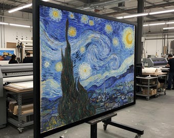 May include: Large framed print of Van Gogh's "Starry Night" painting. The artwork features a swirling blue night sky with yellow stars and a crescent moon. The print is displayed on a black stand in a workshop.