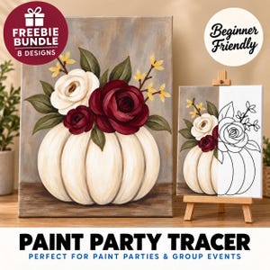May include: A paint party tracer kit featuring a canvas with a painted white pumpkin topped with white and dark red roses and green leaves. A second canvas on a wooden easel shows the same floral pumpkin design, half-painted and half-outlined in black.