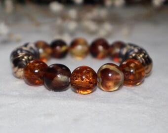 Pulsera de cuentas de ámbar y tonos tierra: joyería artesanal con un toque especial