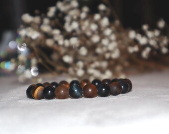 Pulsera de protección del guerrero: ojo de tigre y ónix negro. Pulsera de cristal que protege, fortalece y da confianza.