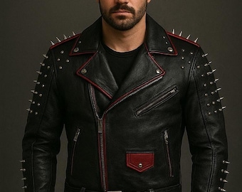 May include: Black leather jacket with red trim and silver spikes. The jacket features a classic biker style with a zippered front, multiple pockets, and a belted waist. The design includes a red pocket and red trim along the collar and seams.