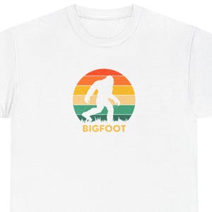 Bigfoot Sunset Graphic Tee: Funny Outdoors Adventure Shirt