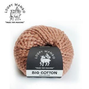 May include: A ball of thick, light brown "Big Cotton" yarn by Loopy Mango. The yarn is a soft, chunky knit, perfect for various crafting projects. The Loopy Mango logo and text are visible on a black label.