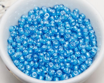 TOHO Size 8 Japanese Glass Seed Beads White Lined Aqua Blue Transparent 10 gm Bag