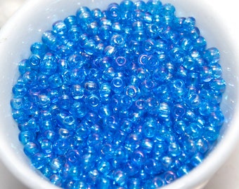 TOHO Size 8 Japanese Glass Seed Beads Rainbow Coat Aqua Blue Transparent 10 gm Bag