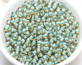 TOHO Size 8 Japanese Glass Seed Beads Topaz Light Sea Foam Lined 10 gm Bag