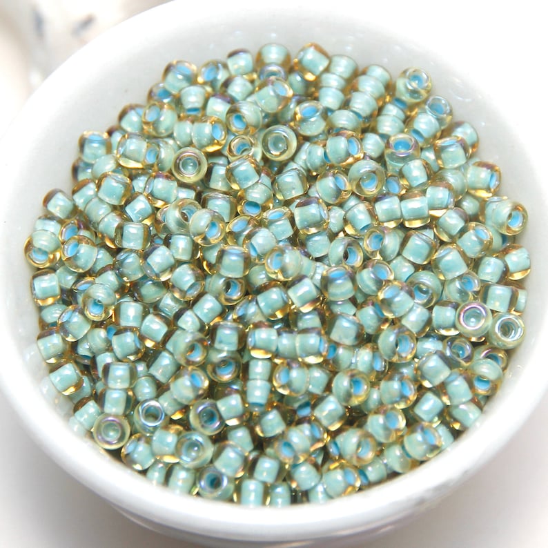 TOHO Size 8 Japanese Glass Seed Beads Topaz Light Sea Foam Lined 10 gm Bag image 1