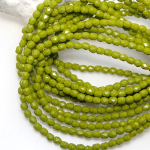 Dekkend avocadogroen 4 mm vuurgepolijst kristal x 50 kralen