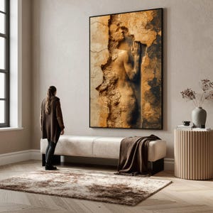 May include: A large framed artwork shows a sculpted figure emerging from a textured, ochre-coloured wall. The artwork is the focal point of a room with a neutral colour palette, featuring a bench, rug, and side table.