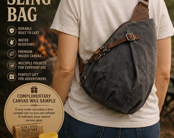 May include: A dark gray waxed canvas sling bag with brown leather straps and metal hardware. The bag features a zippered main compartment and an adjustable buckle closure. Included is a rectangular bar of Fern + Feral Field Wax for maintenance.