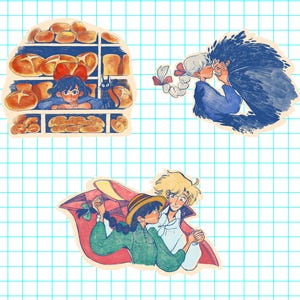 Puede incluir: Tres pegatinas coloridas con ilustraciones de estilo anime. Una muestra a una ni&ntilde;a con un lazo rojo en una panader&iacute;a con un gato negro. Otra representa a una pareja abraz&aacute;ndose. La &uacute;ltima muestra a una pareja bailando con una manta roja.