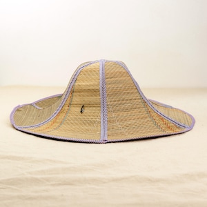 Two straw hats displayed together classic, foldable, and stylish. Perfect for outdoor adventures, travel, and sun protection while staying eco-friendly.