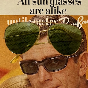 May include: Vintage advertisement featuring a man wearing two pairs of sunglasses. The top pair is gold-rimmed aviator style with green lenses. The bottom pair is a dark, rectangular frame. Text at the top reads "All sunglasses are alike" and "Ray-Ban" is visible.