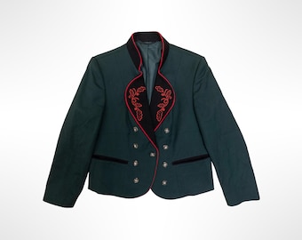 May include: A dark green blazer featuring a black stand-up collar with red piping and red embroidered leaf motifs. The jacket has a double-breasted front closure with six silver-toned metal buttons and two horizontal black welt pockets at the waist.