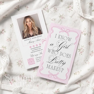 May include: Two business cards on a floral fabric. One card features a photo of a woman and reads "Sophia Dahlberg, Makeup Artist." The other card says "I know a girl who does pretty makeup" in a pink frame.