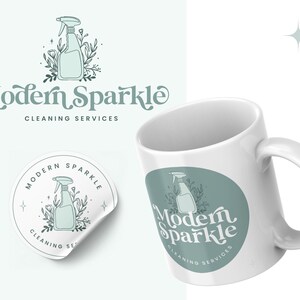 May include: A white mug with a green circle design featuring a cleaning spray bottle and the text "Modern Sparkle Cleaning Services".
