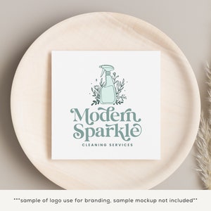 May include: A logo design for a cleaning service called "Modern Sparkle" featuring a stylized illustration of a spray bottle with flowers and the text "Modern Sparkle Cleaning Services".