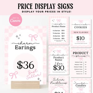 May include: Pink and white price display signs with bow accents. The signs display product names and prices for items like earrings, cookies, necklaces, and candles. The text includes "Price Display Signs" and "Display Your Prices in Style!"