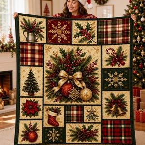 May include: A rectangular throw blanket featuring a patchwork design of Christmas-themed illustrations including holly, pine branches, red berries, snowflakes, plaid patterns, a candy cane, a stocking, bells, and a central ornament with a gold bow.