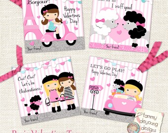 May include: Four printable Valentine's Day gift tags featuring a Parisian theme. The tags feature pink and white stripes, hearts, and illustrations of girls in berets, a scooter, a poodle, and a car. The text on the tags includes "Bonjour!", "Happy Valentines Day!", "Ooh la la! I wuff you!", "Oui! Oui! Let's be Valentines!", and "Let's go play! Happy Valentines Day!"