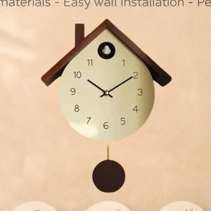 May include: A decorative wooden cuckoo clock with a silent Scandinavian design. The clock features a light-colored face with black hands and numerals, a dark brown wooden frame, and a pendulum. The text on the image says "Decorative Cuckoo Clock in Wood".