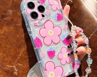 Funda con correa PetalCharm Blossom: funda floral rosa para iPhone con cordón de fresa
