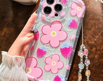 Funda con correa floral BloomCharm: funda rosa a prueba de golpes para iPhone con cordón para la muñeca a juego