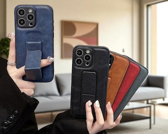 Funda con soporte magnético: soporte plegable y correa para la muñeca (para iPhone X a 16 Plus)