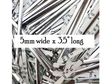 May include: A pile of silver metal nose wire for face masks. The wire is 5mm wide and 3.5 inches long.