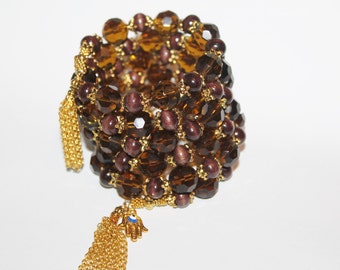 Pulsera de cuentas de Hamsa de ojo malvado hecha a mano: madera y cristal de cuarzo