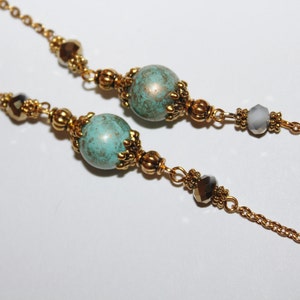 Elegante brillenketting: turquoise en gouden brilhouderketting