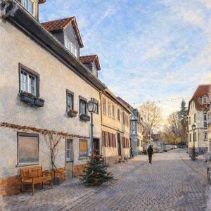 May include: A quaint street scene featuring buildings with red-tiled roofs and cobblestone paving. A small Christmas tree is on the pavement. A person walks down the street under a blue sky with a vapour trail.