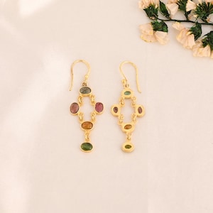 multi tourmaline, chandelier earrings, gemstone dangle, boho chic earrings, gold plated drops, natural stone jewelry, long drop earrings, handmade gemstone, colorful gem earrings, statement tourmaline, tourmaline jewelry, dangling brass earrings, oval cut earrings