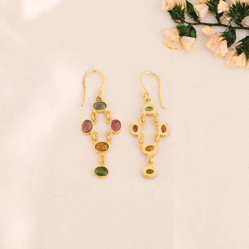 multi tourmaline, chandelier earrings, gemstone dangle, boho chic earrings, gold plated drops, natural stone jewelry, long drop earrings, handmade gemstone, colorful gem earrings, statement tourmaline, tourmaline jewelry, dangling brass earrings, oval cut earrings